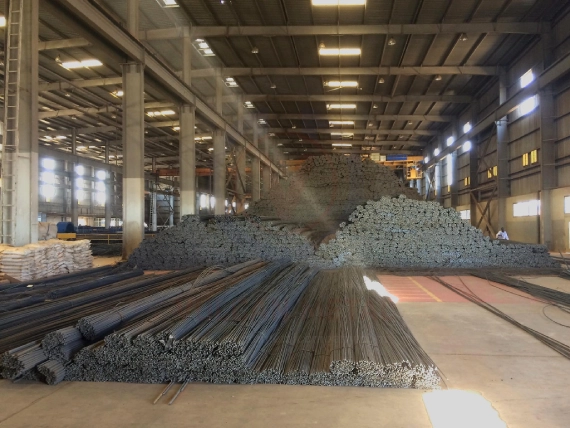 rebar mill stock area with bundled rebars ready for shipment